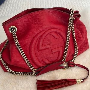 Red Gucci bag, it’s a beautiful lipstick red, previously loved. Good condition.